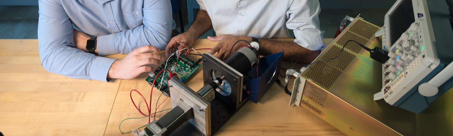 Students Working With a Motherboard